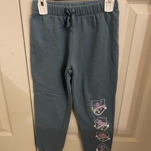 Small, sweat pants, Harry Potter logos.